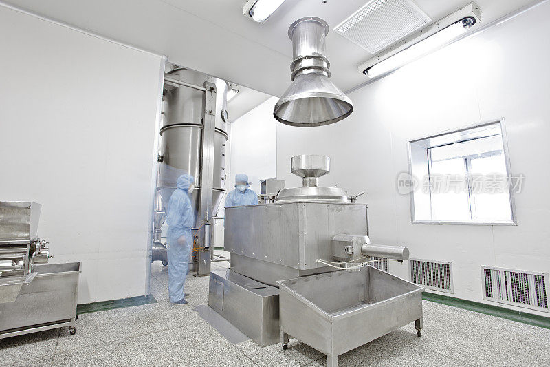 pharmaceutical factory equipment working in clean room